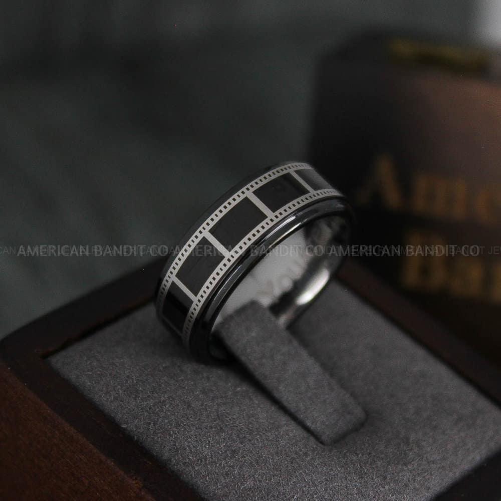 IMG_4738 Filmstrip Ring, Photography Ring, Camera Ring, Lens Ring, Camera Lens Ring, Black Ring, Black Tungsten Wedding Band, Black Wedding Band - Image 1