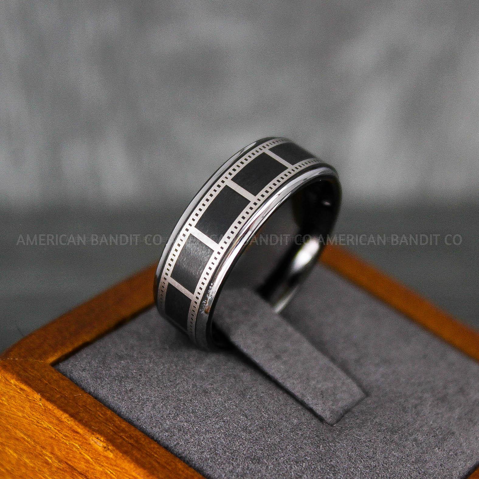 IMG_6842 Filmstrip Ring, Photography Ring, Camera Ring, Lens Ring, Camera Lens Ring, Black Ring, Black Tungsten Wedding Band, Black Wedding Band - Image 1