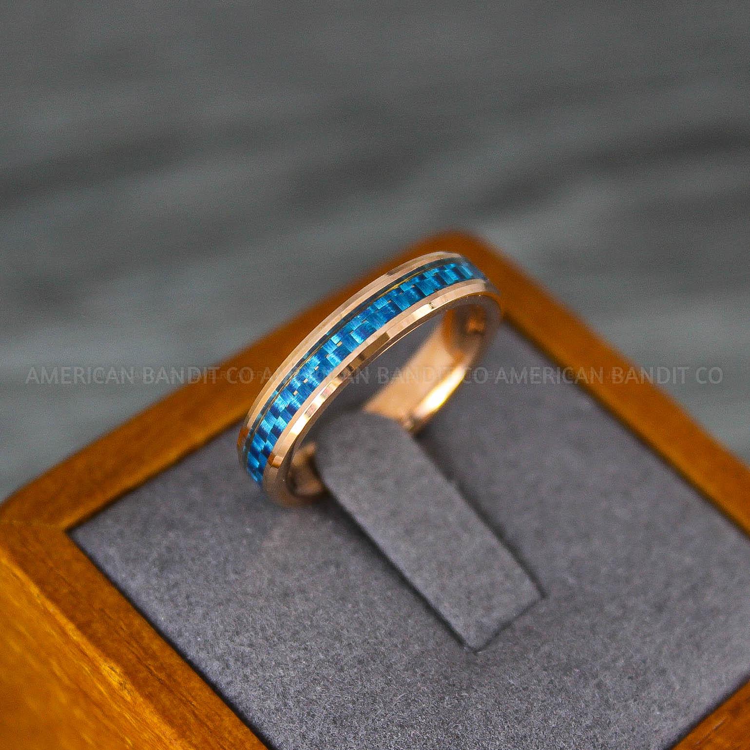 IMG_8191 Rose Gold Wedding Band, Rose Gold Wedding Ring, Rose Gold Tungsten Ring with Blue Carbon Fiber Inlay, 4mm Rose Gold Ring - Image 1