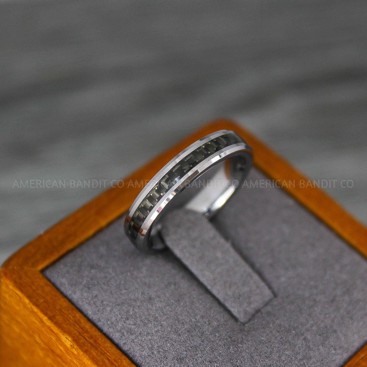 IMG_8205 Silver Wedding Band, Silver Wedding Ring, Silver Tungsten Ring with Black Carbon Fiber Inlay, 4mm Silver Ring - Image 1