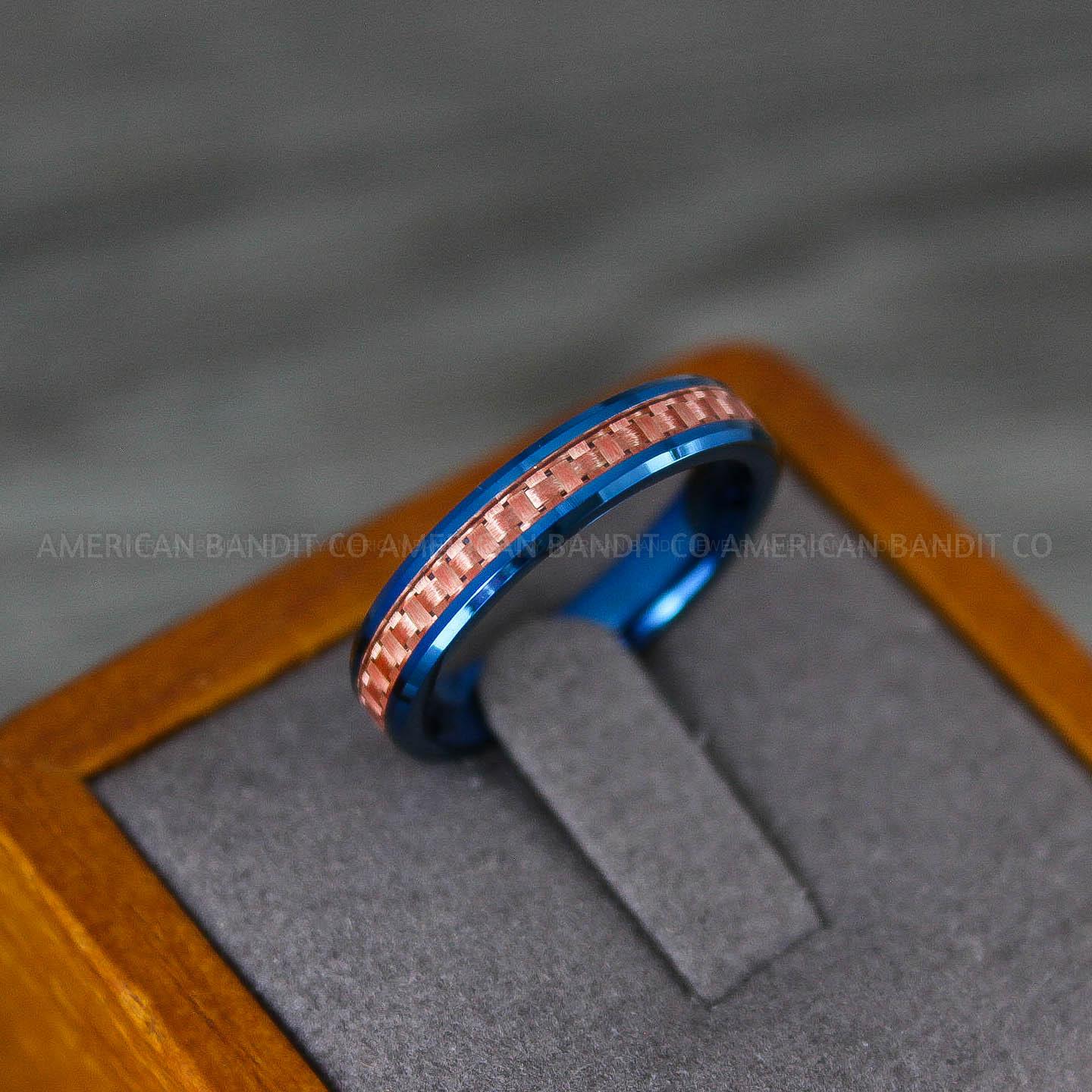IMG_8216 Blue Wedding Band, Blue Wedding Ring, Blue Tungsten Ring with Pink Carbon Fiber Inlay, 4mm Blue Ring - Image 1